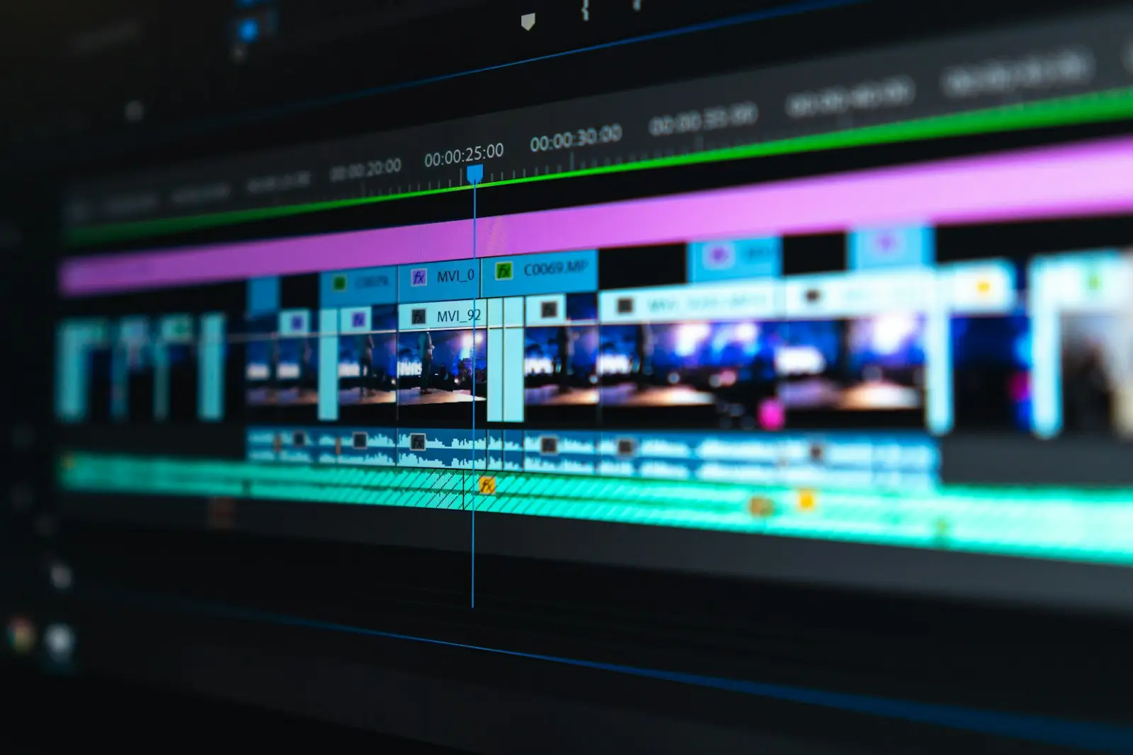 Close-up of a video editing timeline with clips and audio tracks